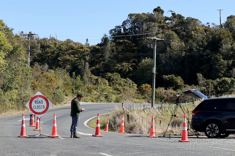 A roadblock close to where a police shootout occurred near the town of Piopio, in New Zealand's Waikato region Photograph: DJ MILLS/AFP via Getty Images          