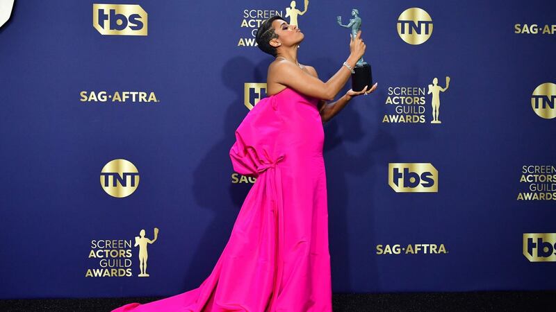 Ariana DeBose poses with her award for outstanding performance by a female actor in a supporting role for West Side Story. Photograph: Frederic J Brown/AFP via Getty