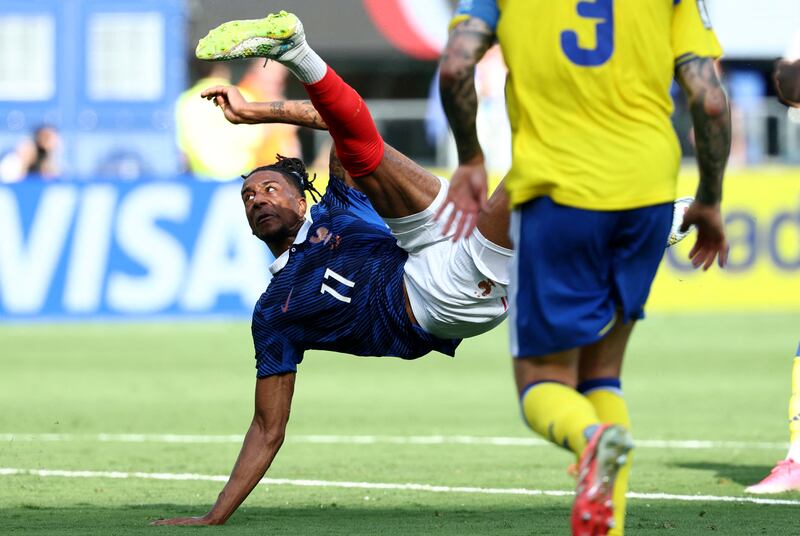 Michael Olise attempts a shot on goal for France. Photograph: Franck Fife/AFP via Getty Images