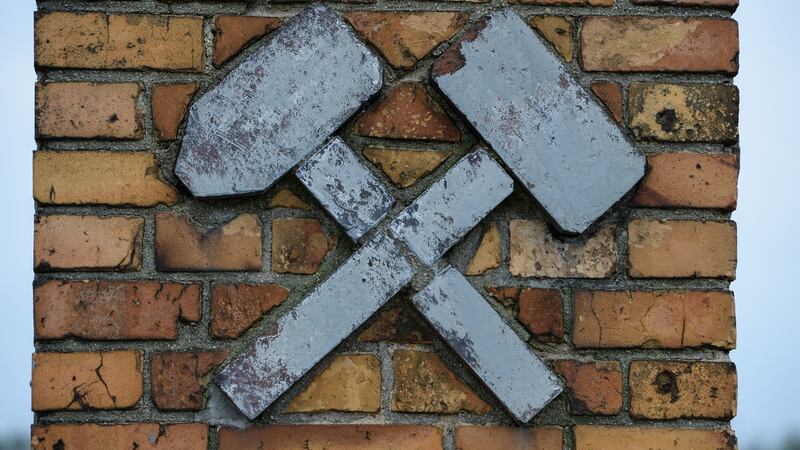 Mining symbol on a brick gate near Knappenrode Briquette Factory and Museum. Photograph:Frank Miller