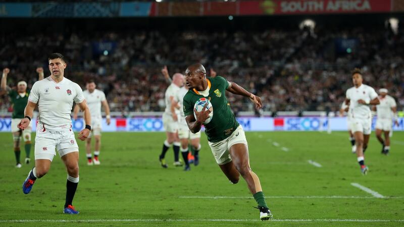 Makazole Mapimpi of South Africa breaks through to score his team’s first try during the Rugby World Cup final victory over England  at the International Stadium Yokohama in Yokohama, Kanagawa, Japan. Photograph:  Dan Mullan/Getty Images