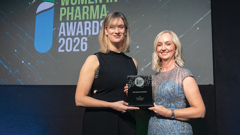 Sarah Hayes, awards judge, presents the best quality leadership award to Áine Hopkins, PTC Therapeutics