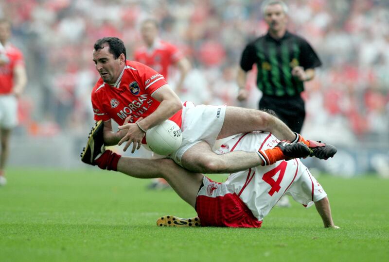 Armagh's Martin O'Rourke and Tyrone's Micheal McGee in the 2005 All-Ireland semi-final. Photograph: Tom Honan/Inpho
