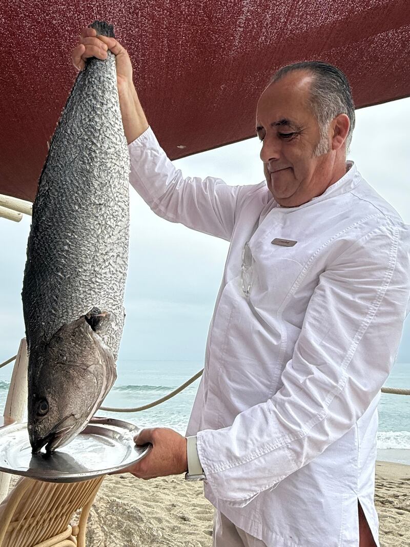 Cristobál ready to grill fish at Soleo Restaurant in El Fuerte Hotel. Photograph: Gemma Tipton