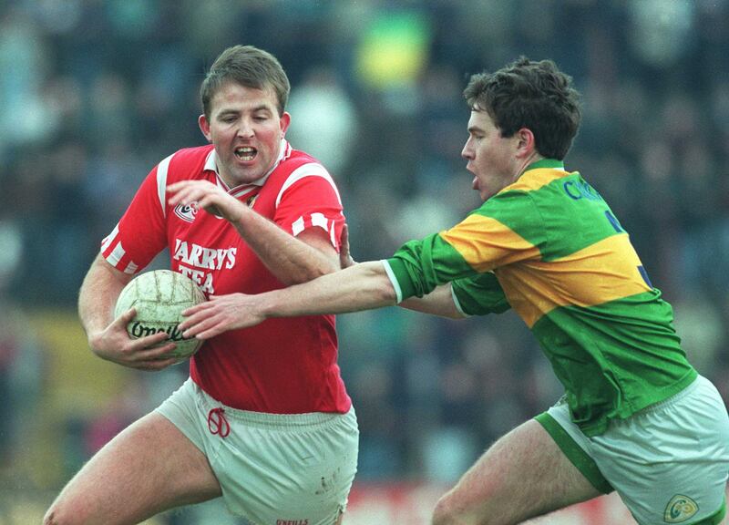 Colin Corkery of Cork is tackled by Kerry's Sean Buckley. 31/3/1996.
Photograph: Tom Honan/Inpho