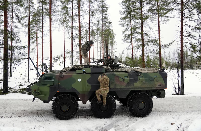 Members of the Finnish army and British army in a training exercise on Nato's border with Russia. Photograph: Owen Humphreys/PA Wire