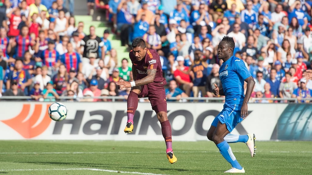 Paulinho scores the winner for Barcelona against Getafe. Photograph: Denis Doyle/Getty Images