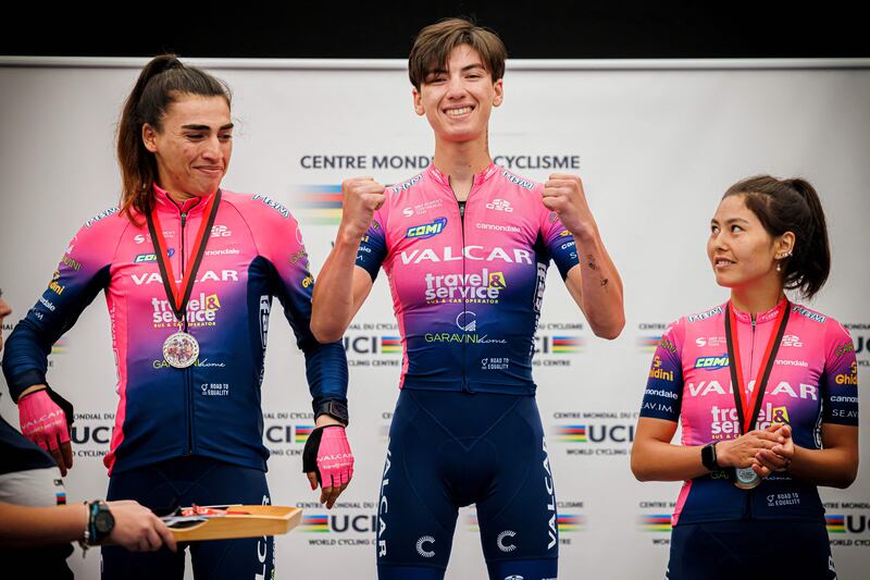 Afghan cyclists Yulduz Hashimi, Fariba Hashimi and Zahra Rezayee on the podium of the 2022 women's road cycling championships of Afghanistan in Aigle, western Switzerland. Photograph: ValentinFlauraud/AFP via Getty Images