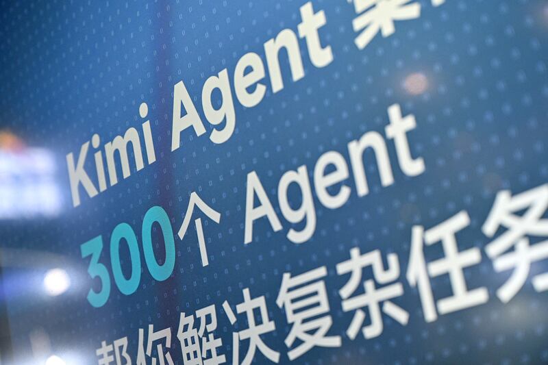 A Kimi logo is seen on a screen at the Moonshot AI stand at the World Artificial Intelligence Conference in Shanghai. Photograph: Hector Retamal/AFP/Getty Images
