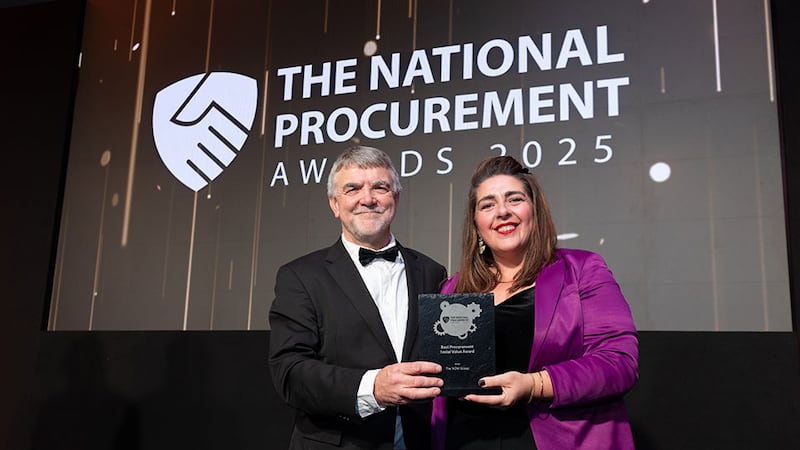 Colum Foley, awards judge, presents the best procurement social value award award to Maeve Monaghan, The NOW Group.