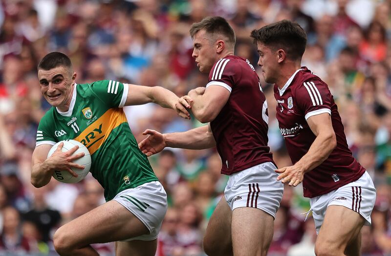 Kerry's Seán O'Shea and John Daly of Galway in Sunday's memorable All-Ireland final. Photograph: Inpho
