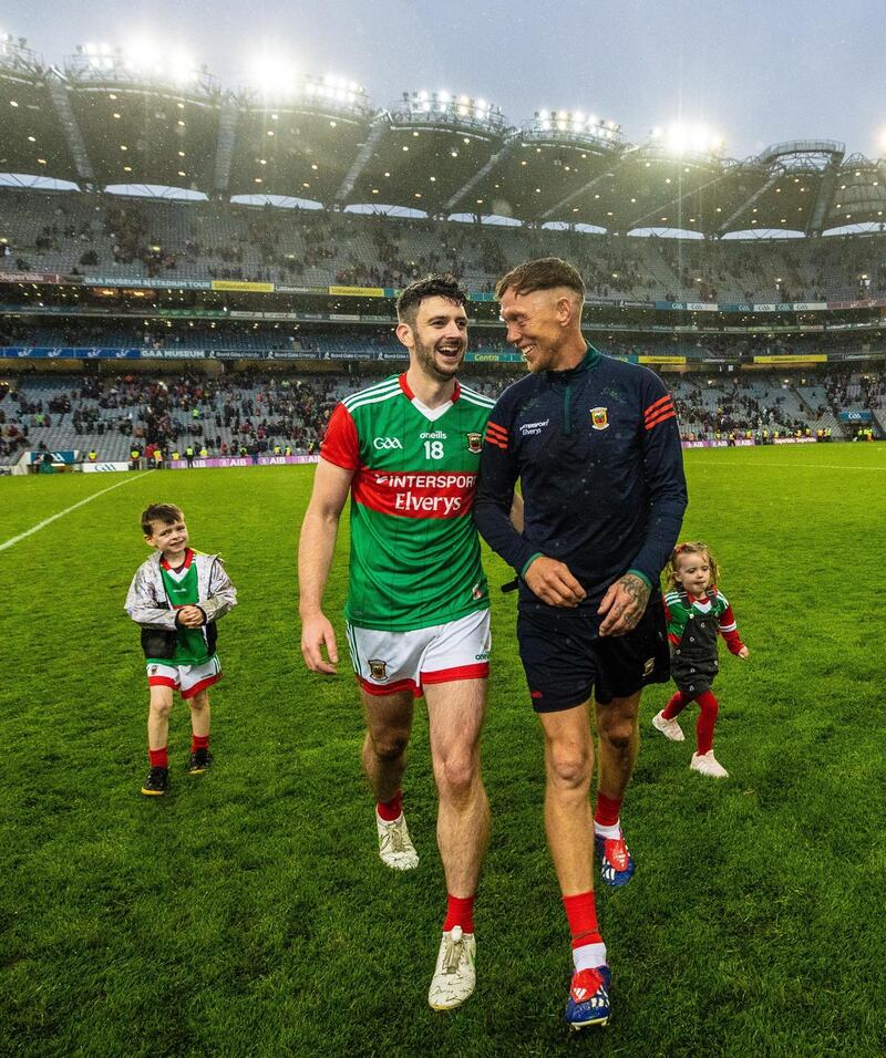 Mayo’s Brendan Harrison celebrates with  Ciarán McDonald after the 2021 GAA  All-Ireland senior football championship semi-final against Dublin in Croke Park. Photograph: James Crombie/Inpho