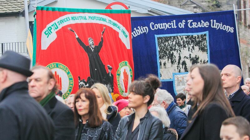 Union Banners featuring Jim Larkin at the Jer O’Leary funeral. Photo: Gareth Chaney /  Collins