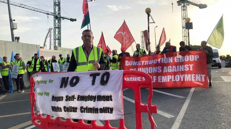Construction workers picketing the new national children’s hospital on Friday as part of a protest over alleged “bogus work practices”  on the site.