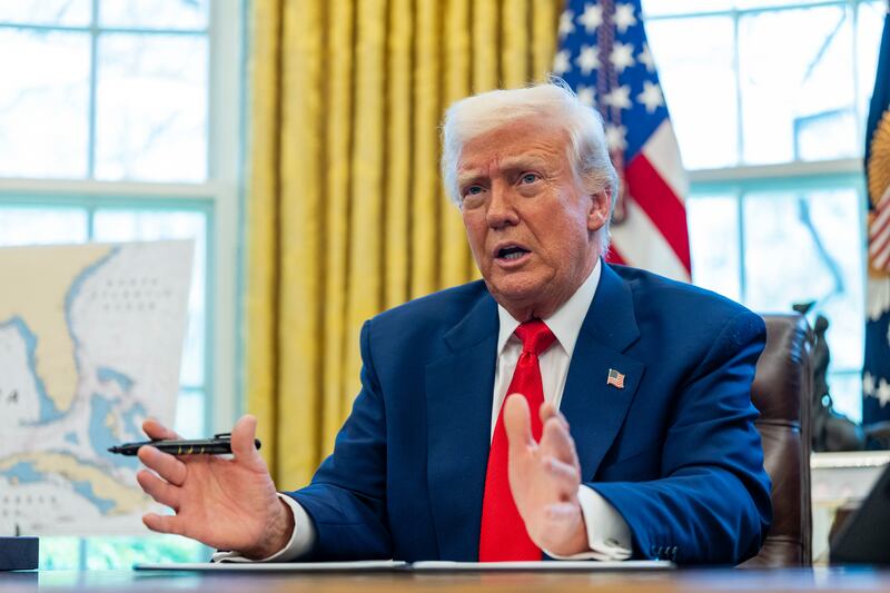 President Donald Trump speaks as he signs executive orders in the Oval Office on Wednesday. Photograph: Eric Lee/The New York Times
                      