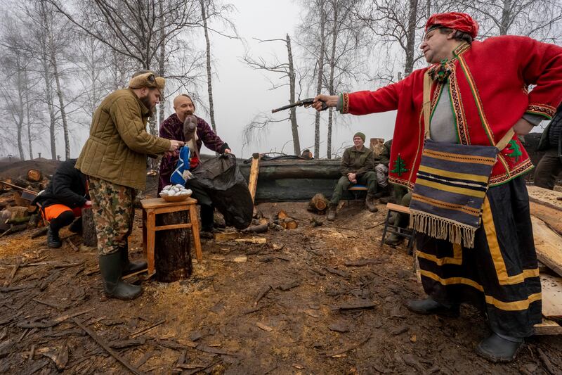 A group performs for Ukraine’s National Guard soldiers to mark Christmas at their positions close to the Russian border near Kharkiv. Photograph: Andrii Marienko/AP