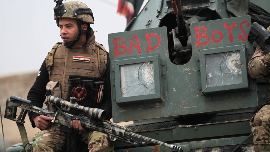 Iraqi pro-government forces on patrol in eastern Mosul during the military operation against Islamic State. Photograph: AFP