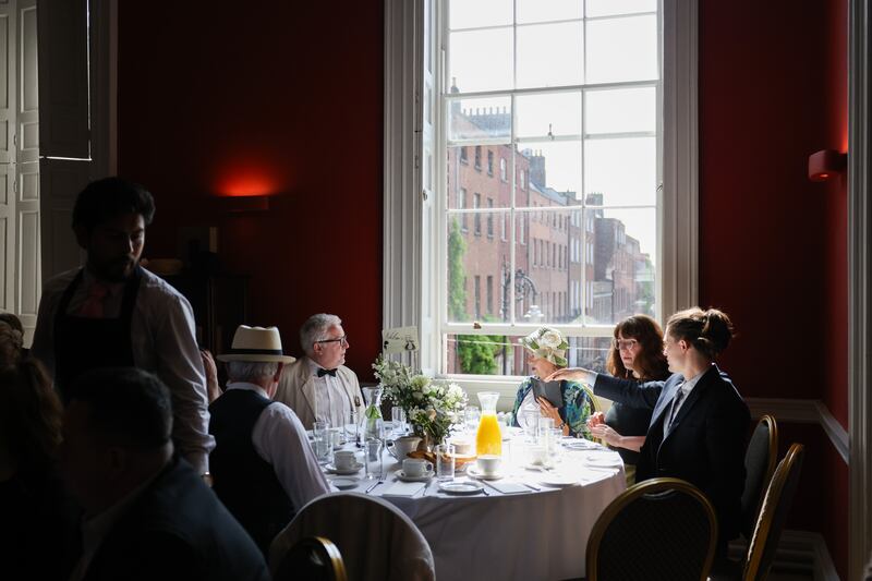 People gather at the table for Bloomsday Breakfast in Belvedere College, Dublin. Photograph: Dan Dennison