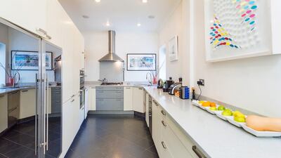 There’s a lovely modern Rational kitchen off the diningroom in the side extension