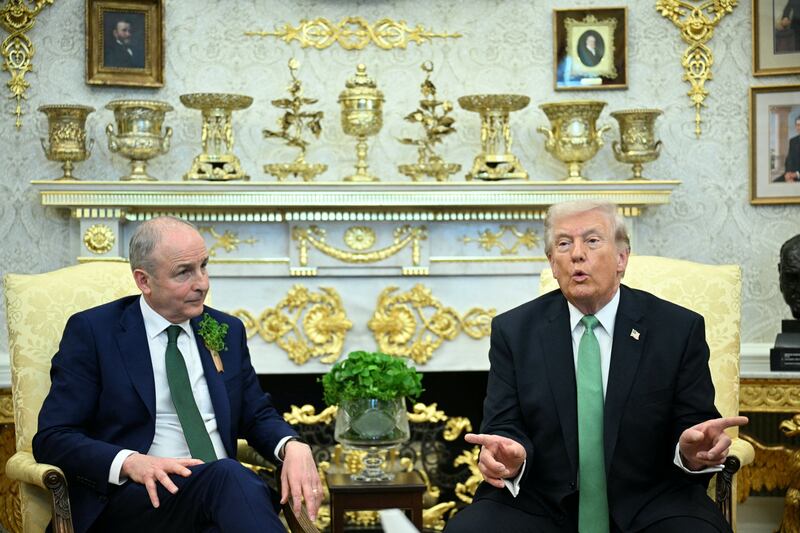 Taoiseach Micheál Martin listens to US president Donald Trump during their bilateral meeting in the Oval Office of the White House in Washington. Photograph: Jim Watson/AFP via Getty Images
