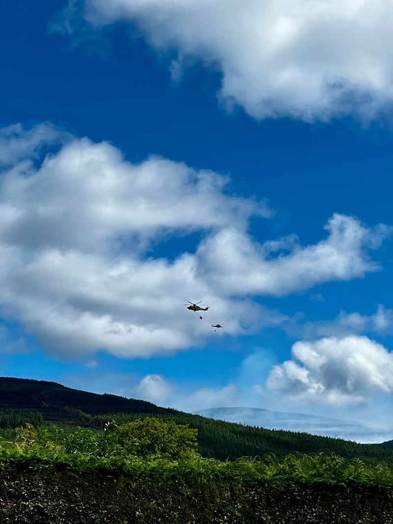 Helicopters were attempting to douse wildfires on Slievenamon, Co Tipperary, on Sunday. Photograph: Seán Ryan