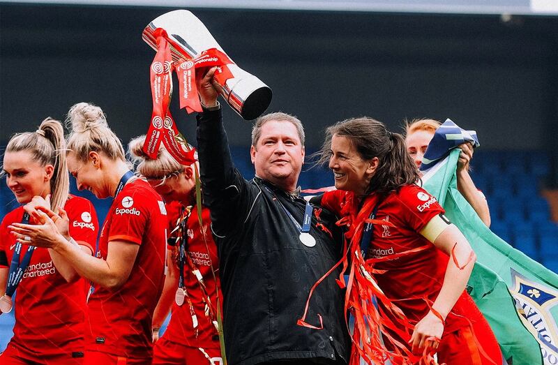 Matt Beard and Niamh Fahey celebrating Liverpool's 2021–22 Championship title triumph