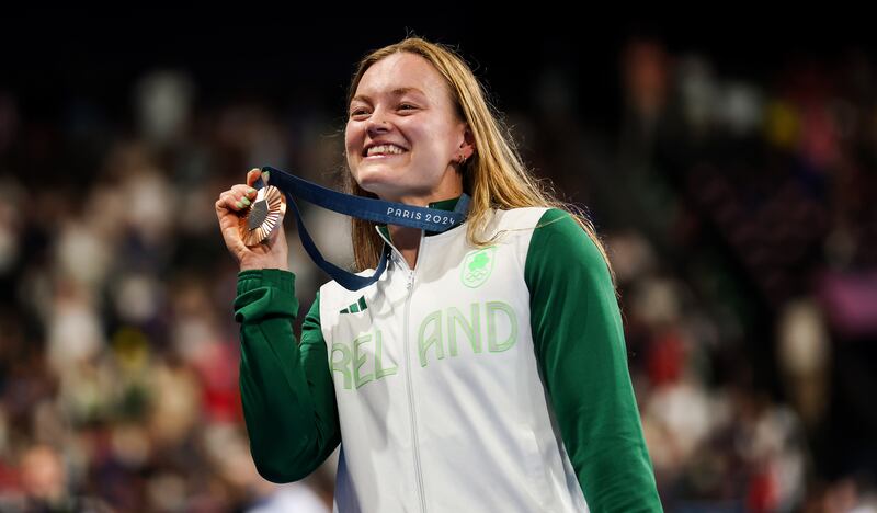 Ireland’s Mona McSharry celebrates with her bronze medal after the 100m breaststroke final. Photograph: James Crombie/Inpho 