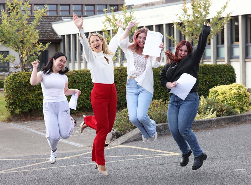 Minister for Education Helen McEntee at her former school, St Joseph’s Mercy Secondary School, in Navan, Co Meath, this morning with students Janaree Ralleta, Nicoleta Pusnei and Oliwia Wojda.
Photograph: Photocall 