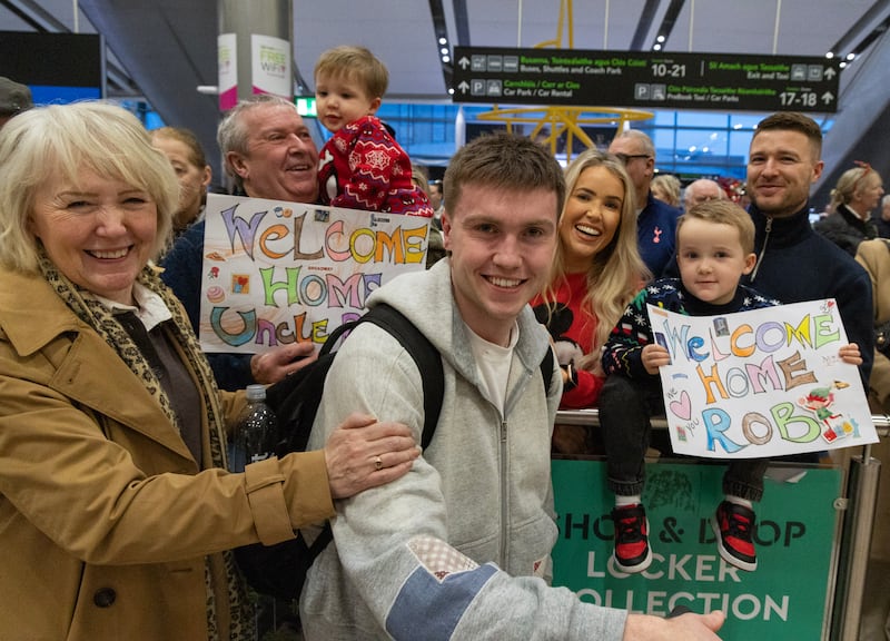 Rob Bulmer is welcomed home by his family, the Masseys from Carlow and Dublin, at Dublin Airport, Terminal 2. Photograph: Colin Keegan/Collins, Dublin
