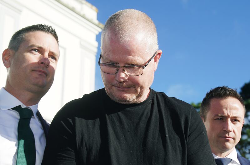 Richard Satchwell (centre) leaving the District Court in Cashel, Co Tipperary, after being charged in connection with the murder of his wife Tina Satchwell in 2023. Photograph: Brian Lawless/PA Wire