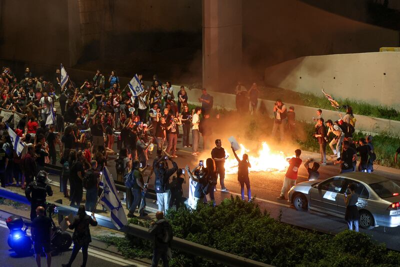 Demonstrators protesting in Jerusalem against the Israeli government. Photograph: Ahmad Gharabli/AFP