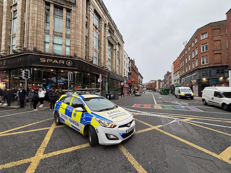 Gardaí closed a section of Dublin's Dame Street following an early-morning collision involving a bin lorry. Photograph: Bryan O'Brien