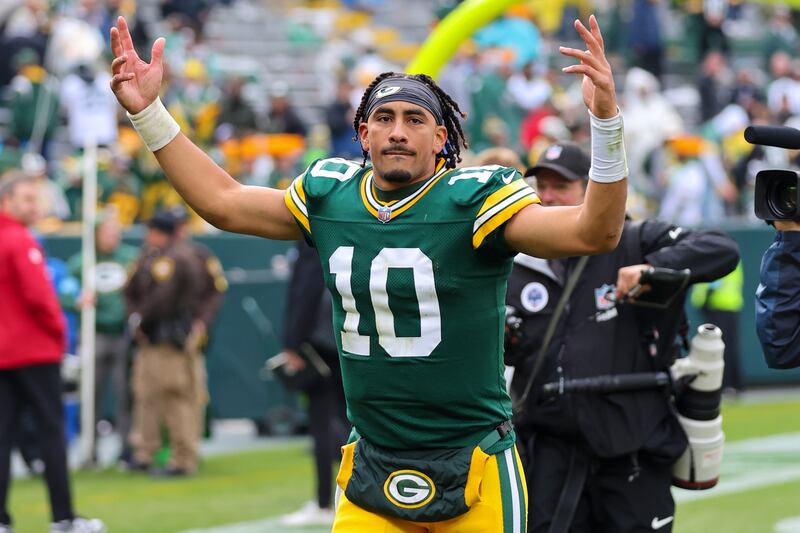 Jordan Love of the Green Bay Packers runs off the field after defeating the Arizona Cardinals 34-13 at Lambeau Field. Photograph: Stacy Revere/Getty Images