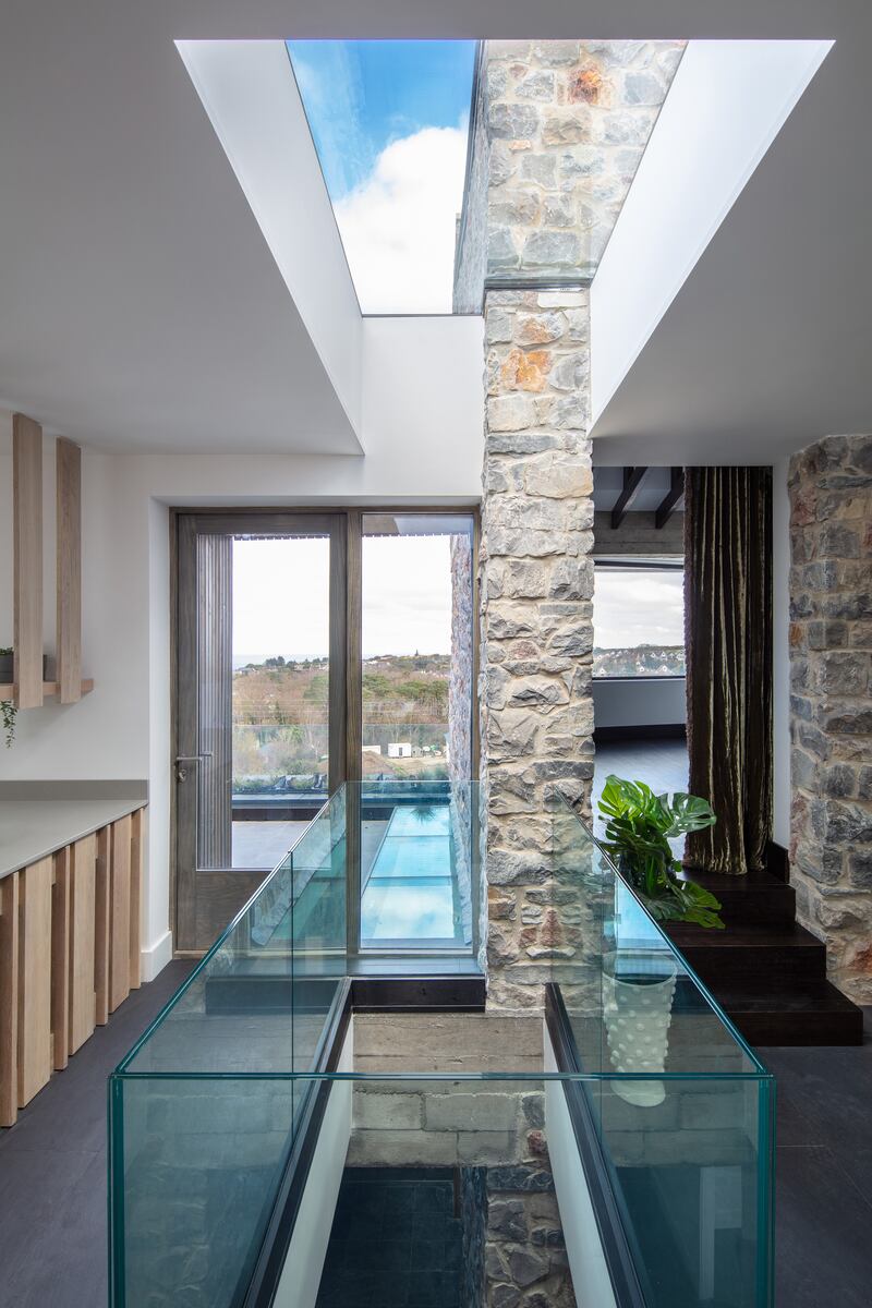 The homeowners hired interior designer Helen Price to help with the likes of lighting, floors, bathroom decor, kitchen cabinetry and countertops