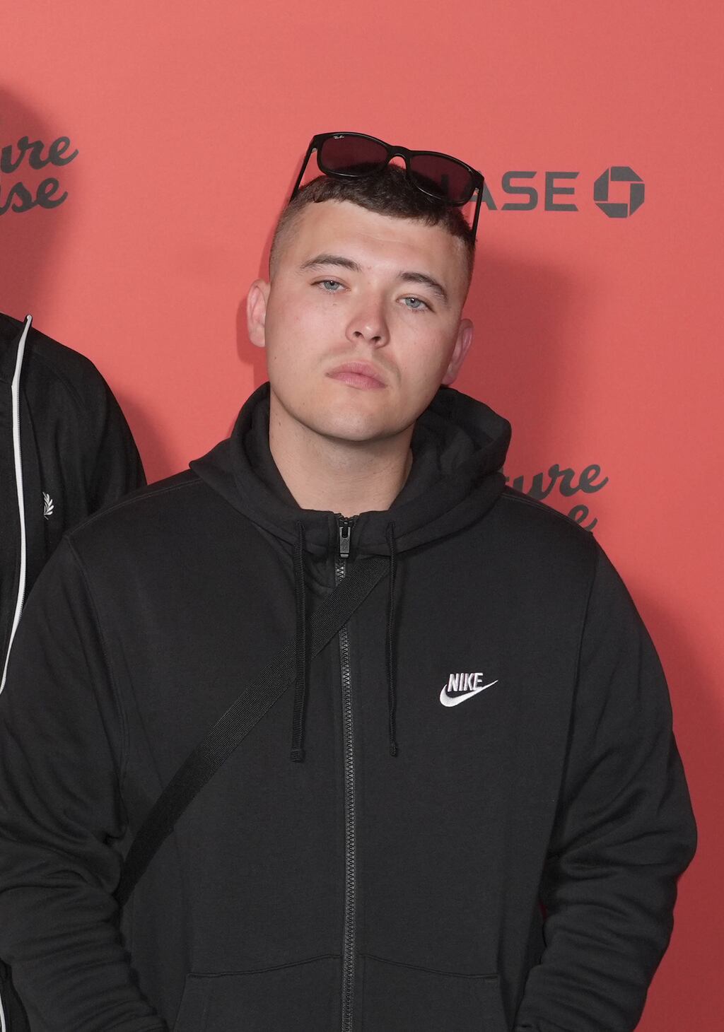 Kneecap rapper 27-year-old Liam Óg Ó hAnnaidh, who performs under the stage name Mo Chara, has been charged with a terrorism offence by British authorities. Photograph: Ian West/PA