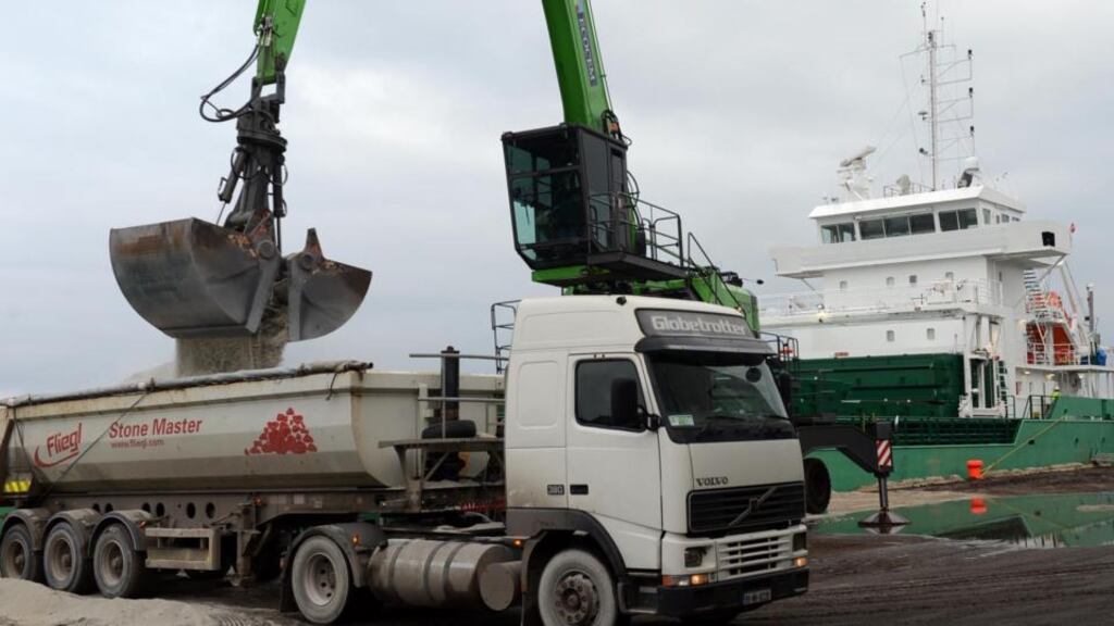 Unloading a ship at Ecocem on the Liffey. Ecocem expects to unload two ships a month carrying slag from northern Spain and western France. Photograph: Eric Luke/The Irish Times