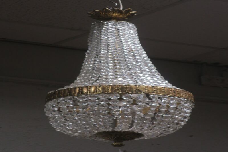 Continental gilt brass and cut glass central light €150-€250. 