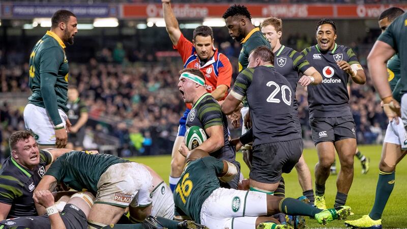 Rob Herring celebrates scoring  his try. Photograph:  Morgan Treacy/Inpho