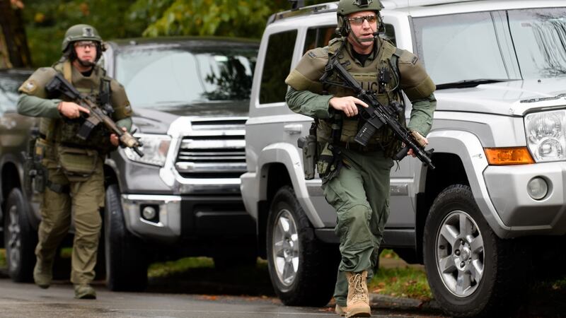Police rapid response team members respond to  a mass shooting at the Tree of Life Synagogue in Pittsburgh. Photograph: Getty