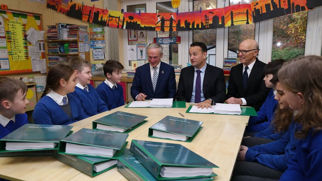 Communications Minister Richard Bruton, Taoiseach Leo Varadkar and US business man David McCourt at St Kevin’s National School, Co Wicklow. Photograph: Niall Carson / PA Wire