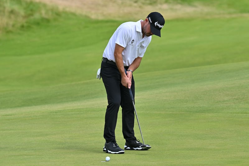 Brian Harman putts on the 9th green. Photograph: Andy Buchanan/Getty