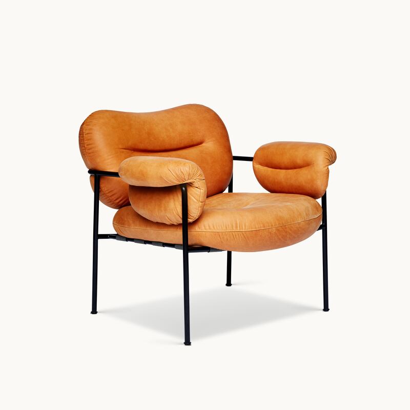 A cognac leather Bollo lounge chair, designed by Andreas Engesvik for Fogia, from €3,143 at Dun Laoghaire-based Lost Weekend, will add warmth to any space