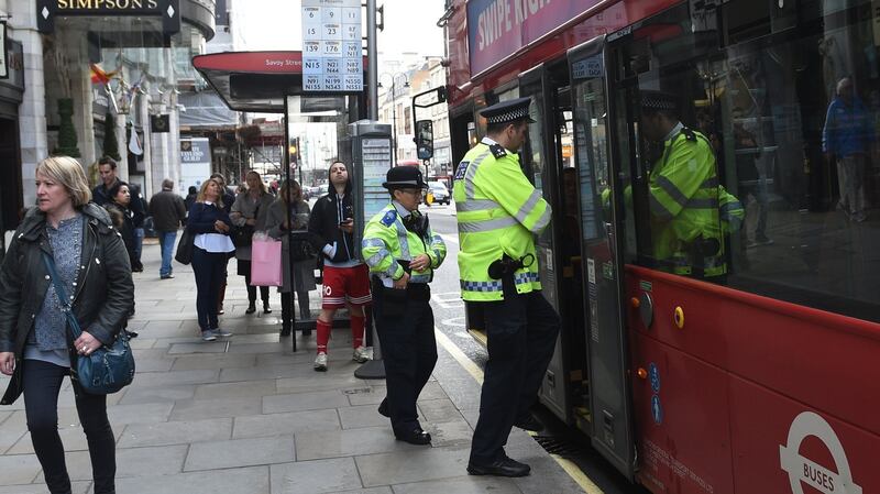 Police patrol a London bus on Saturday after the terror level was increased to “critical” following a terrorist attack in Parson’s Green Underground station, London. Photograph: Facundo Arrizabalaga/EPA