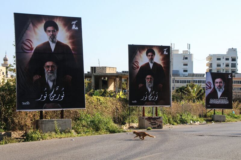 Posters depicting Iran's slain supreme leader Ayatollah Ali Khamenei and his son, the new supreme leader Ayatollah Mojtaba Khamenei, on display at the entrance to the southern Lebanese coastal city of Tyre on Tuesday. Photograph: Kawnat Haju/AFP via Getty