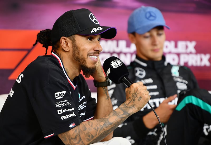 Lewis Hamilton speaks at a press conference before he learned he was promoted to race winner of the Belgium Grand Prix. Photograph: James Sutton/Getty Images