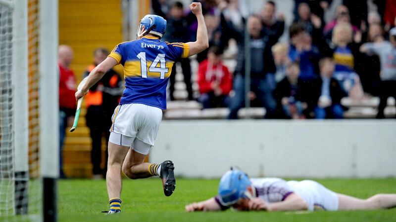 Tipperary’s John McGrath celebrates scoring his side’s  third goal of the game against Wexford at Nowlan Park. Photograph: Ryan Byrne/Inpho