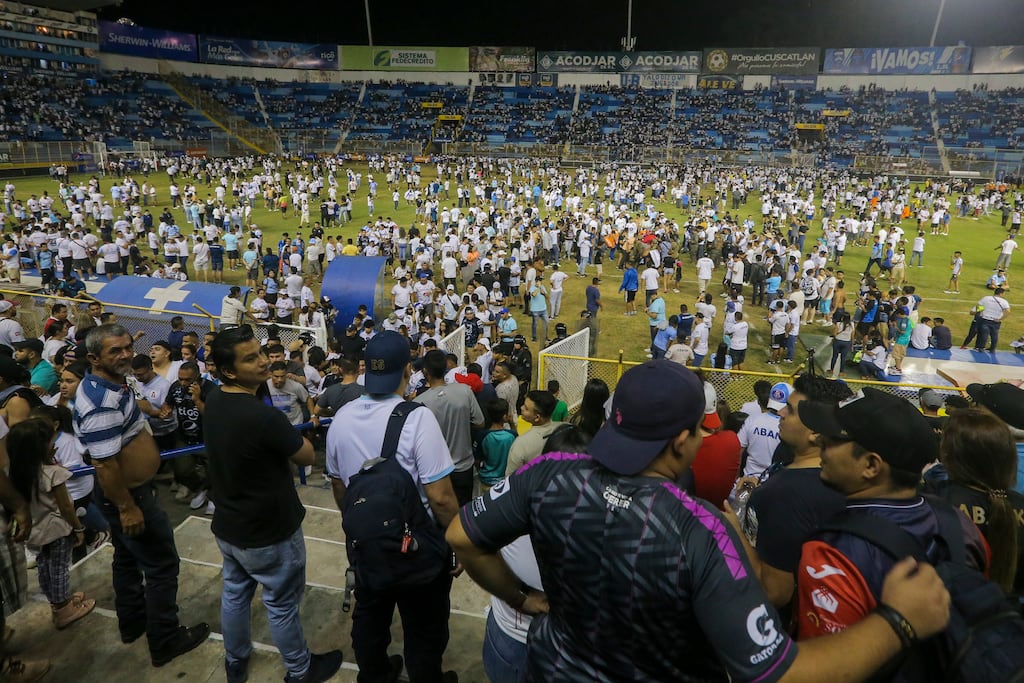 The scene at Cuscatlan stadium in San Salvador, El Salvador, as a stampede there killed at least 12 football fans. Photograph: Milton Flores/AP