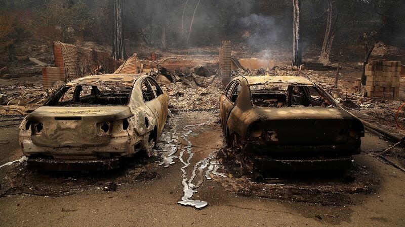 Burned cars sit idle after out-of-control wildfires moved through  Glen Ellen, California, the US. Photograph: Justin Sullivan/Getty Images