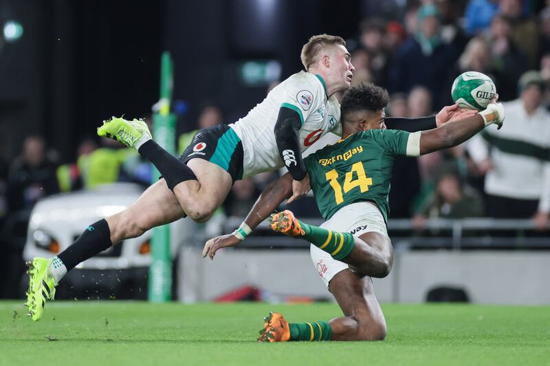 Ireland’s Jack Crowley prevents a try score from South Africa’s Canan Moodie. Photograph: Gary Carr/Inpho