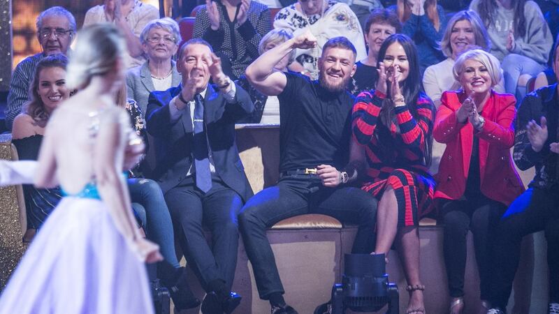 Conor Mc Gregor with his partner Dee watching his sister Erin during the fifth live show of Dancing with the Stars. Photograph: Kyran O’Brien/RTÉ